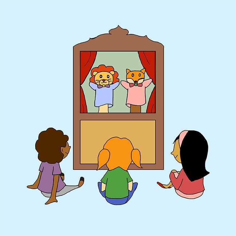 children watching a puppet show